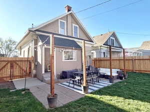 Rear view of house  and patio