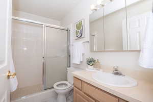 2nd primary suite bathroom featuring a walk in shower.
