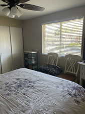 Bedroom 2 with a closet and a ceiling fan