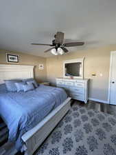 Bedroom 1 with flooring  a ceiling fan