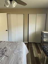 Bedroom 2 featuring multiple closets, and a ceiling fan
