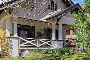 Property entrance with covered porch