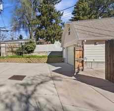 Garage with basketball net.