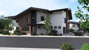 Contemporary house featuring stone siding and stucco siding