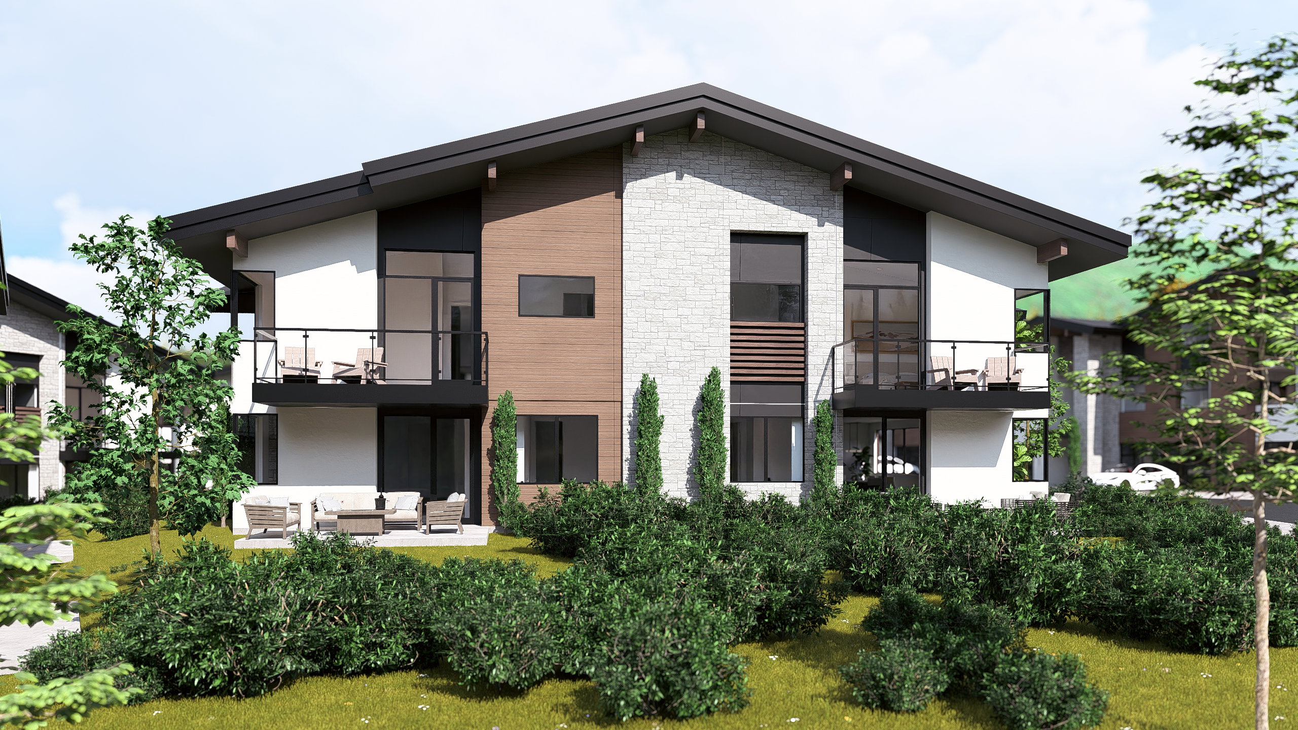 Back of house featuring a balcony, outdoor lounge area, stone siding, and stucco siding