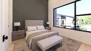 Bedroom with baseboards and light wood-style floors