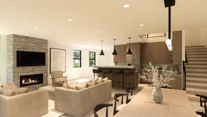 Living room featuring a stone fireplace and recessed lighting