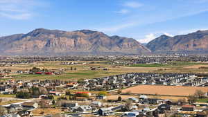 Mountain view featuring nearby suburban area