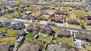 Aerial overview of property's location with nearby suburban area
