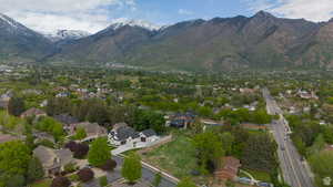Aerial view of residential area featuring a mountain backdrop