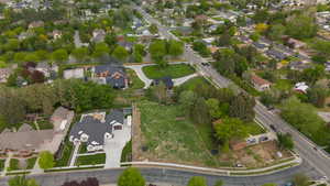 Aerial overview of property's location featuring nearby suburban area