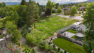 Aerial perspective of suburban area with a mountain backdrop