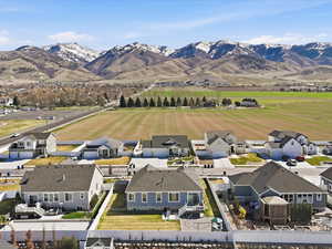 View of mountain background featuring nearby suburban area