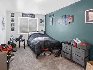 Bedroom with carpet flooring