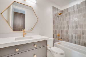 Full bath featuring vanity and tub / shower combination