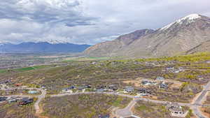 Aerial view of residential area with a mountainous background