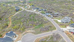 View of property location with nearby suburban area