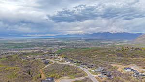 Aerial view of residential area featuring a mountainous background
