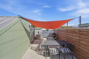 Deck with outdoor dining space