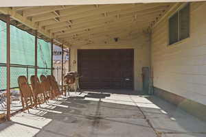Garage featuring driveway