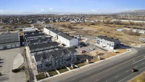 Aerial view of property's location with a mountainous background