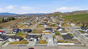 Aerial perspective of suburban area featuring mountains