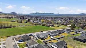 Aerial view of residential area with a mountain backdrop