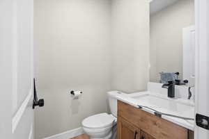 Bathroom featuring toilet and vanity