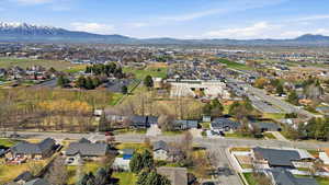 Aerial view of residential area with a mountain backdrop