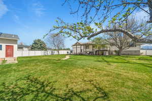 Fenced yard featuring a patio area