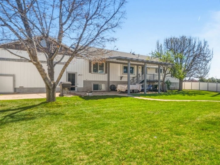 View of fenced backyard
