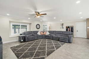 Living area featuring recessed lighting, a ceiling fan, healthy amount of natural light,