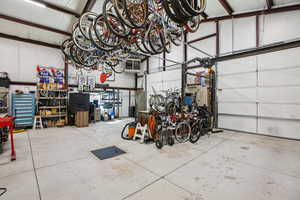 Garage featuring a heating unit and bike storage