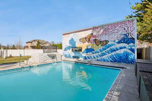 View of pool featuring patio surround