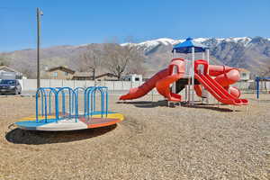 Communal playground with a mountain view