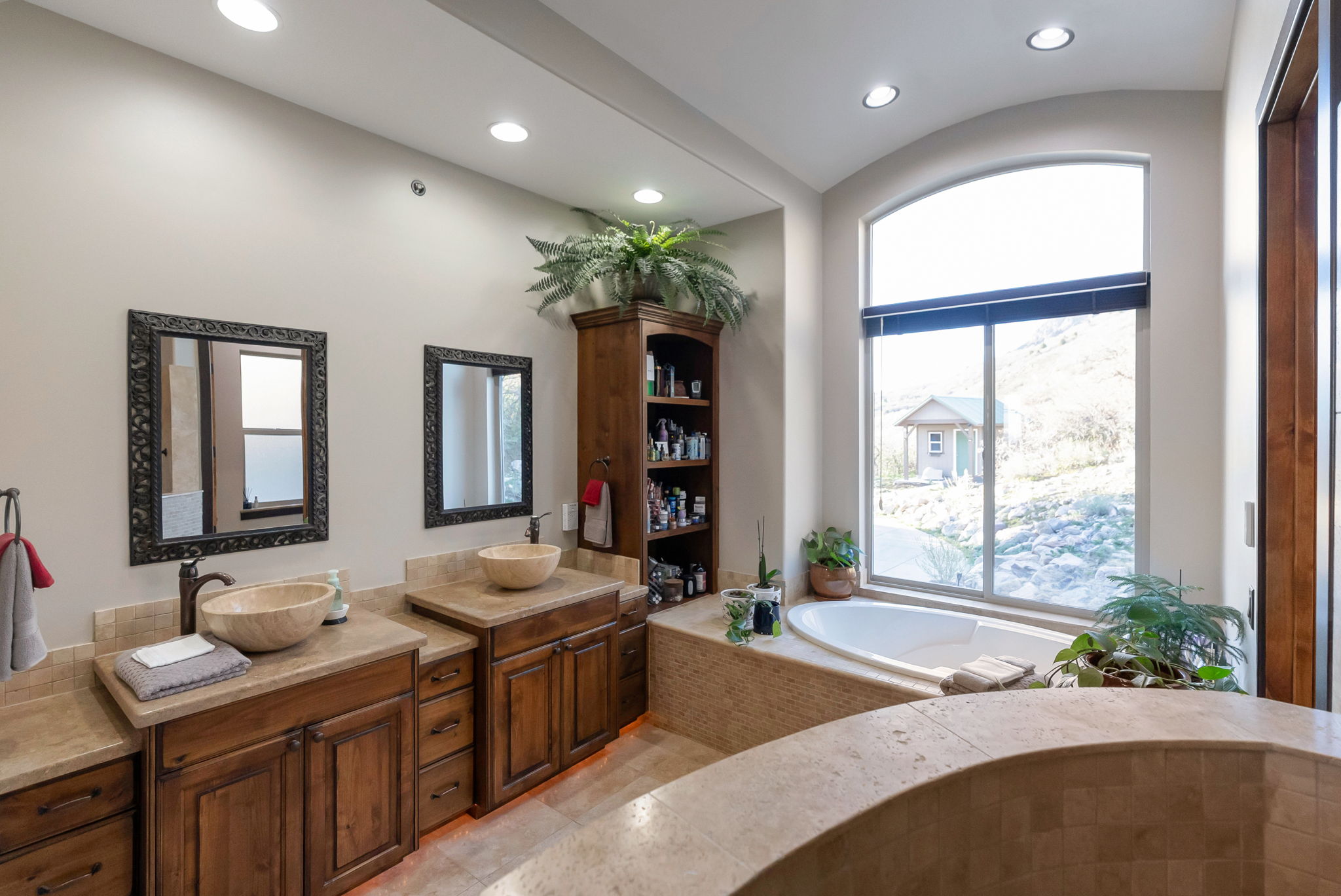 Bathroom with vanity, recessed lighting, a barrel ceiling, and a garden tub