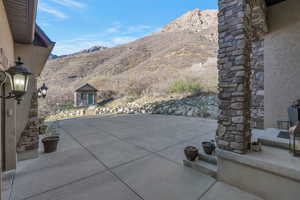 View of patio with a mountain view