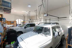 Garage featuring a garage door opener