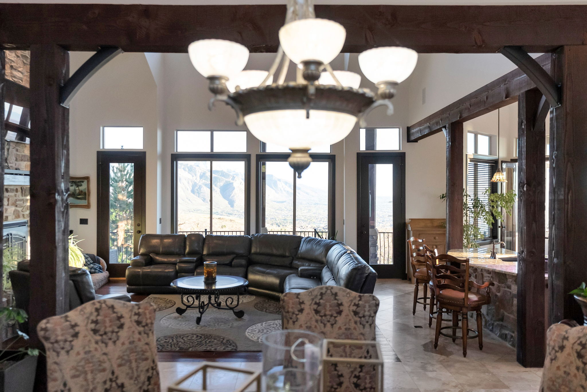 Living area featuring a high ceiling and arched walkways