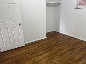 Bedroom 4 with hardwood floors.