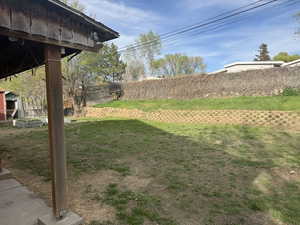 View of fenced backyard