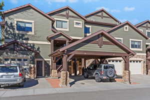 Craftsman house featuring stone siding