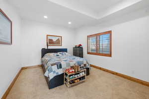 Bedroom featuring recessed lighting and carpet flooring