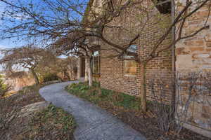 View of home's exterior featuring brick siding