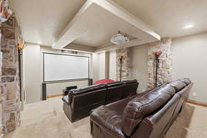 Cinema featuring light carpet and recessed lighting