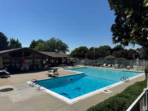 Community pool featuring a patio area