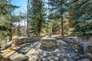 View of patio / terrace with an outdoor fire pit