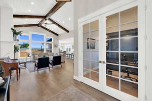 Doorway featuring wood finished floors, french doors, and recessed lighting