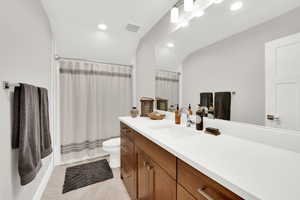 Bathroom featuring vanity and recessed lighting