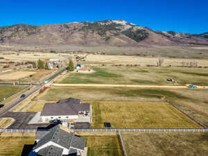 Aerial view of sparsely populated area with a mountain backdrop